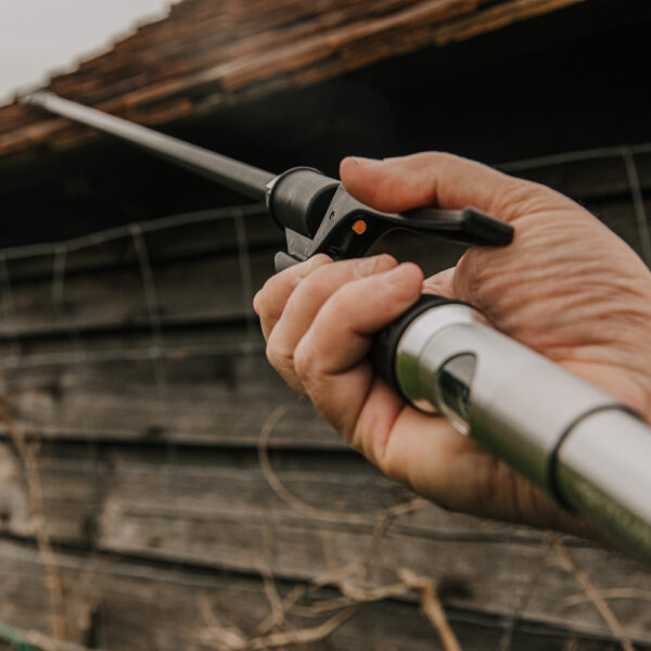 Photo of user squeezing the one handed trigger release